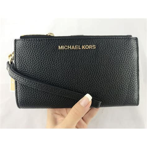 michael kors jet set wallet black silver|Michael Kors wristlet jet set.